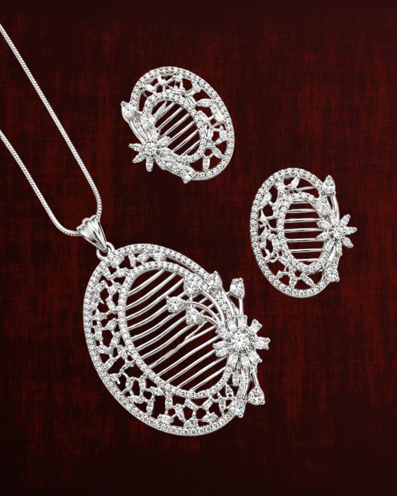 Rageshvari Fashion Silver-Tone Floral Oval Pendant Necklace Set with Matching Stud Earrings | American Diamond Jewellery Set for Women