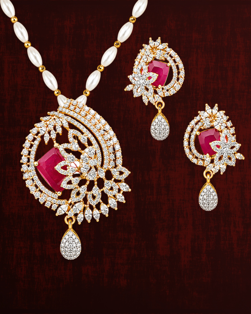 Rageshvari Fashion Gold-Plated Ruby Red American Diamond Floral Pendant Set with Pearl Chain & Matching Earrings